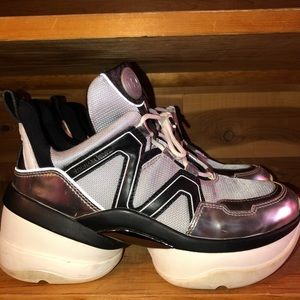 Michael Kors Silver Olympia Sneaker Model.
